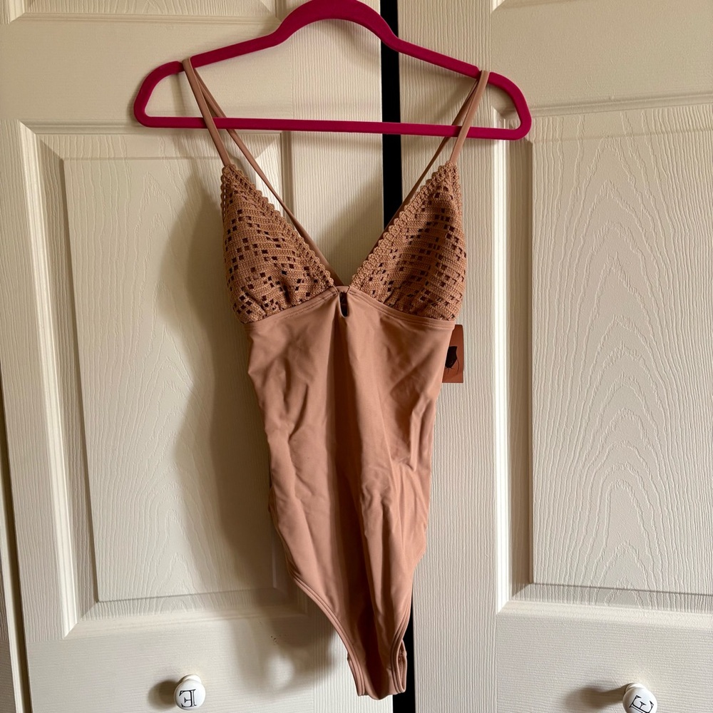 3 FOR $20: Tan swimsuit with crochet Detail. Add to bundle.